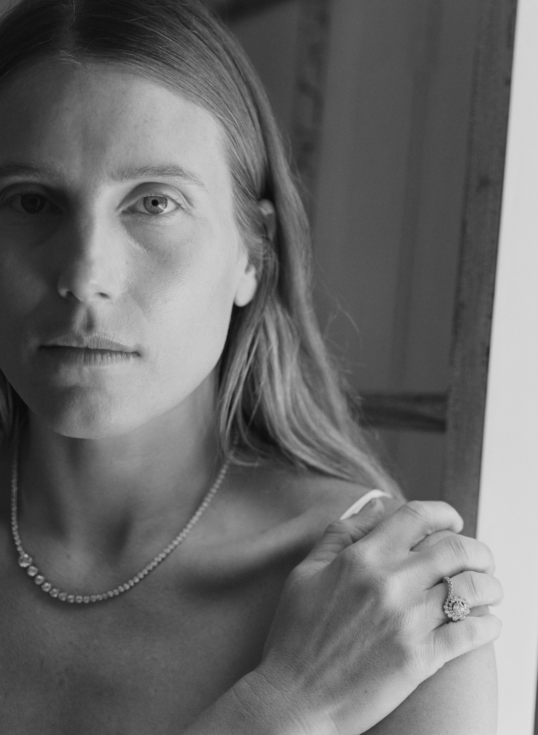 Dree Hemingway wearing Collier de Tennis Royal diamond necklace matched with Plateau diamond diamond ring.