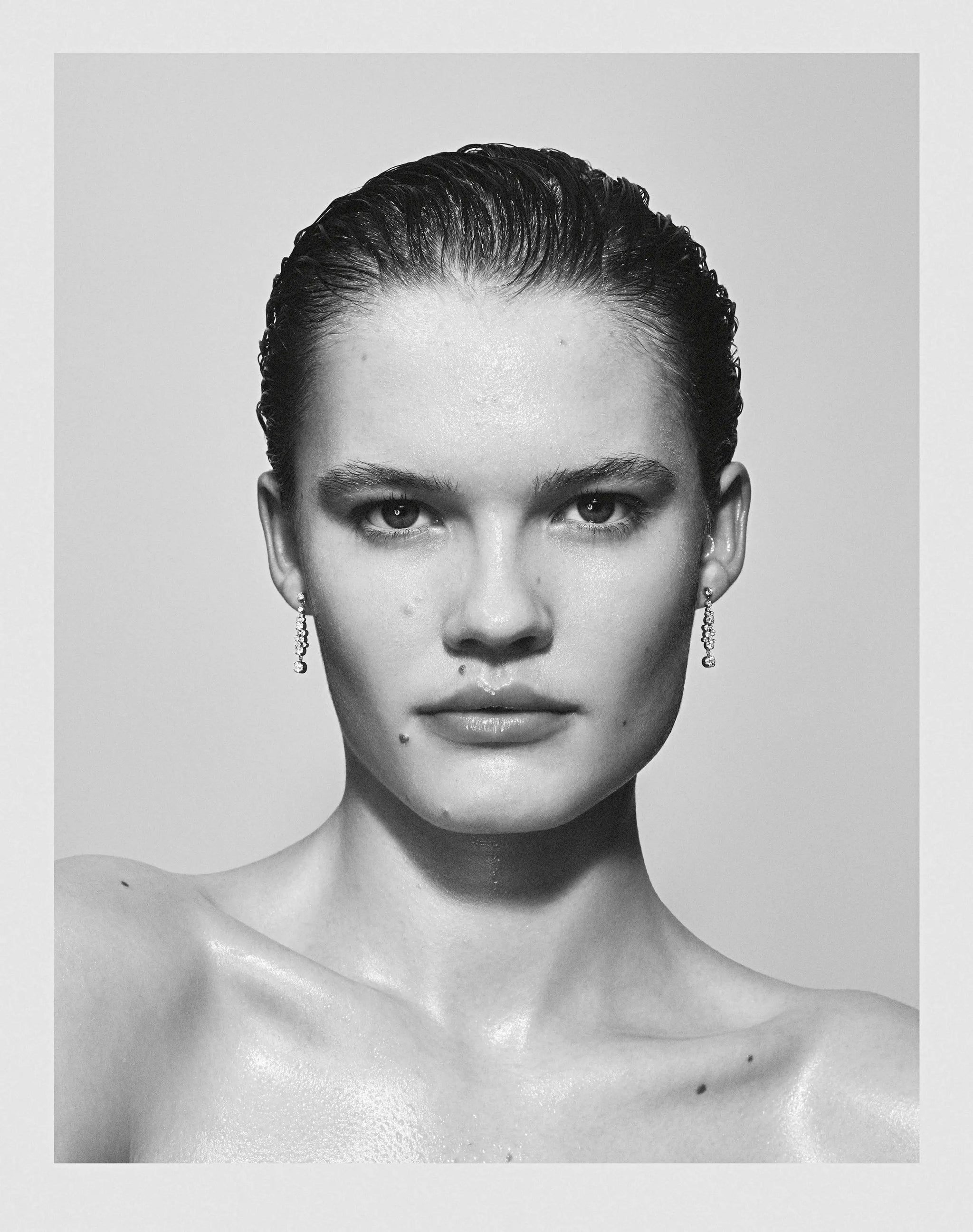 Model wearing Splash diamond earrings