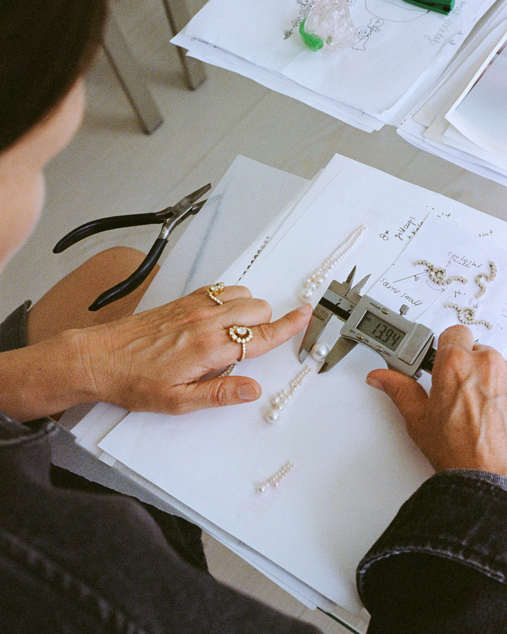 Sophie designing with tools.