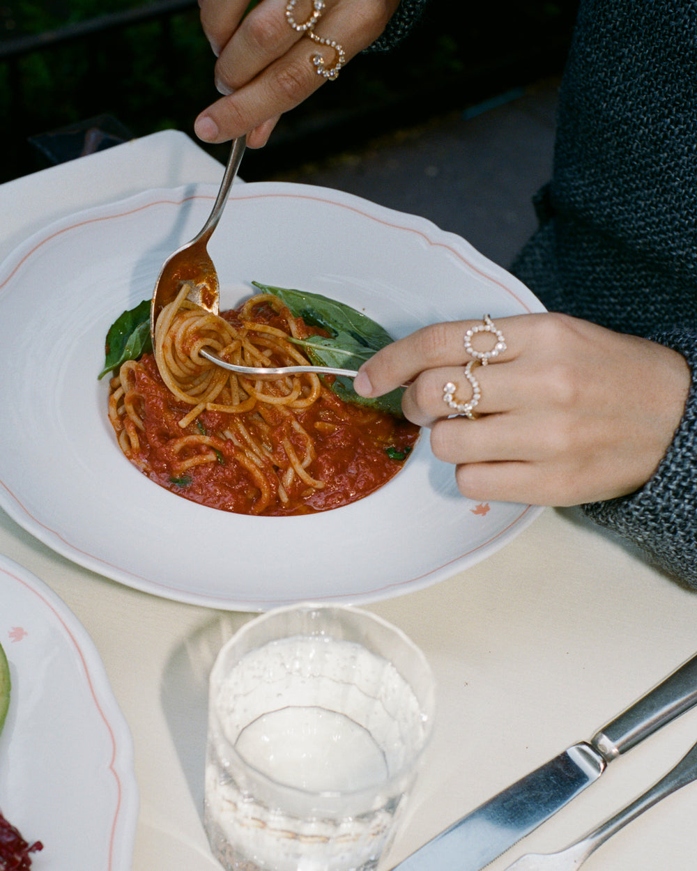 Coco Baudelle wearing diamond rings.