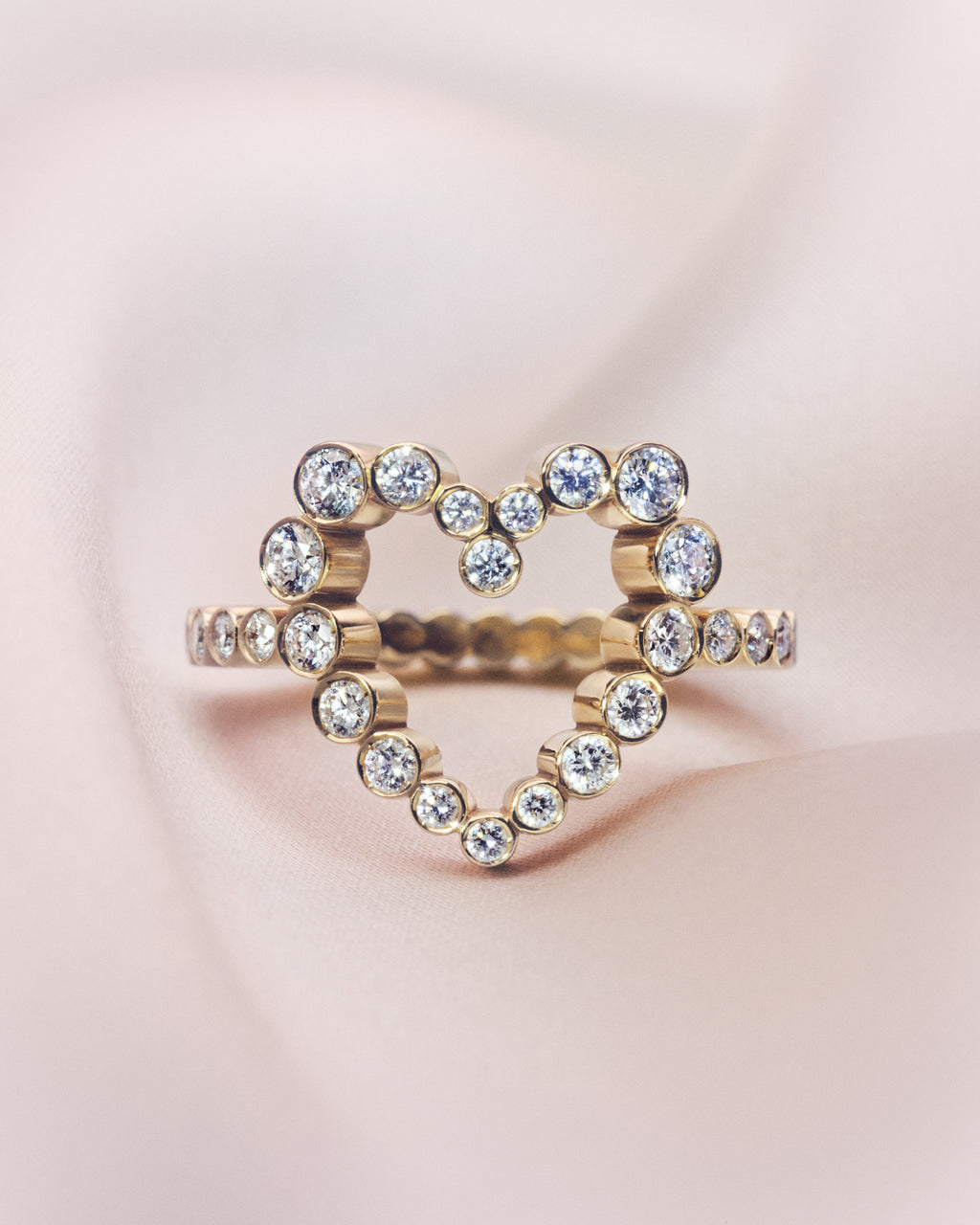 18K yellow gold heart shaped diamond ring. 