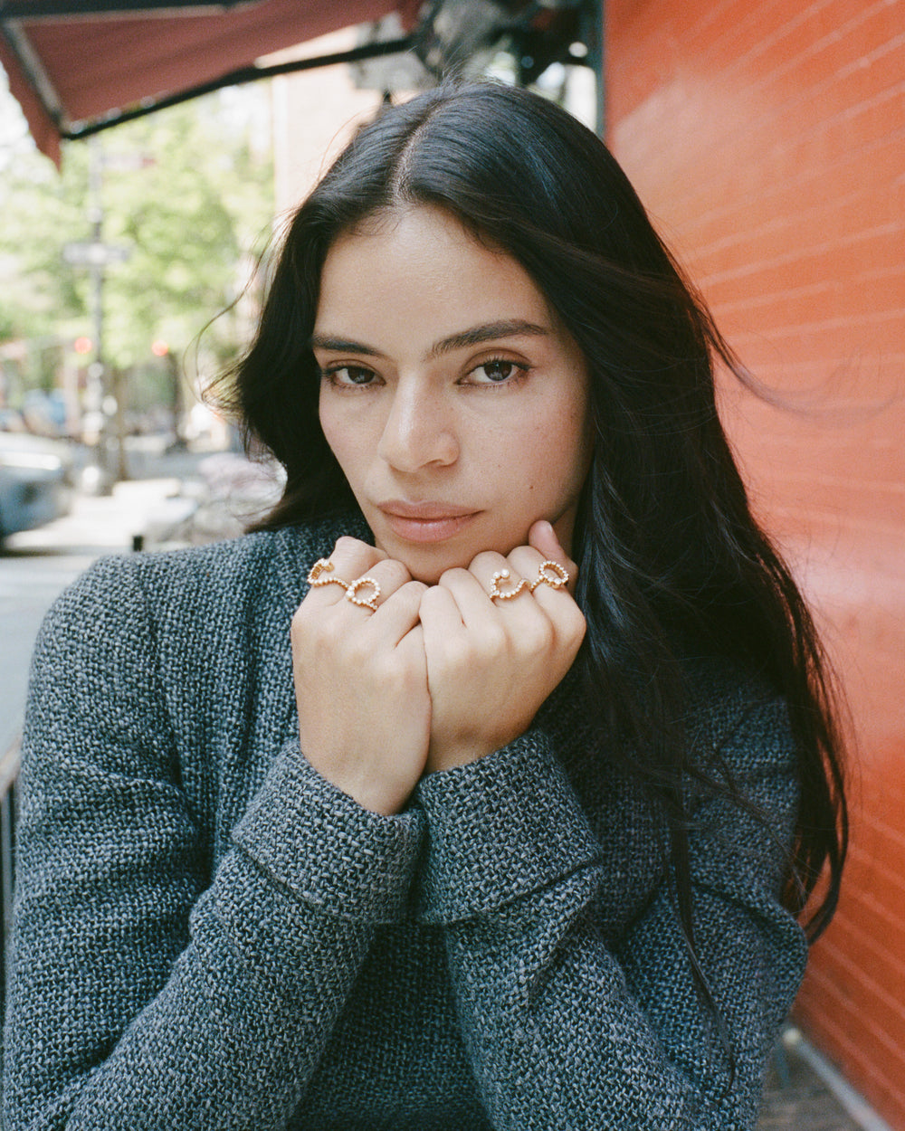 Coco Baudelle wearing diamond rings.