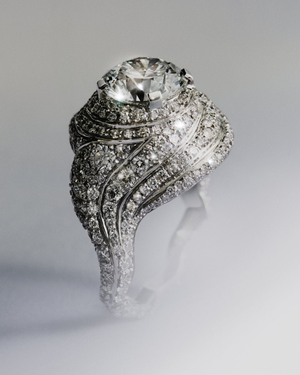 Sky 1 diamond ring with intricate design on a light gray background