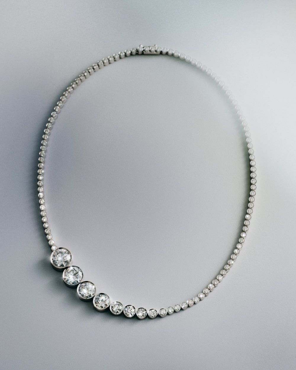 Sky 6 diamond necklace on a light gray background