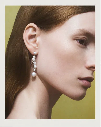 Model wearing Calder Corail pearl earring