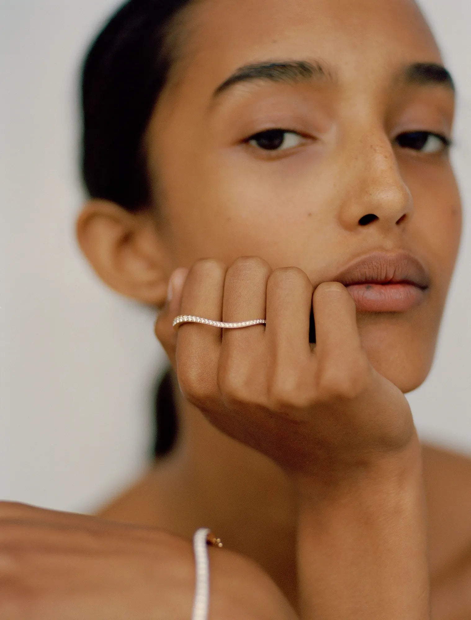 Model wearing Alessi bracelet and Alessi double ring